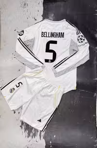 کیت اول رئال مادرید 2026 آستین بلند (ورژن لیگ قهرمانان بلینگهام)