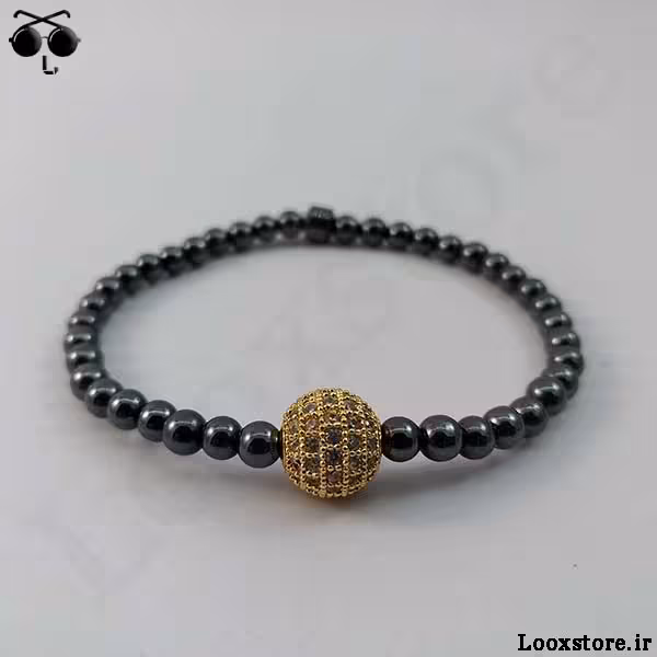 دستبند حدید دودی ریز و مهره نگین دار طلایی
