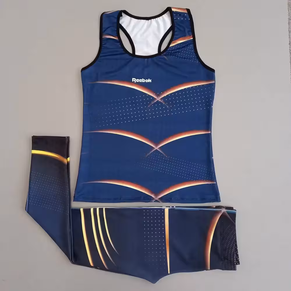 ست تاپ و لگ ورزشی زنانه reebok جنس غواصی