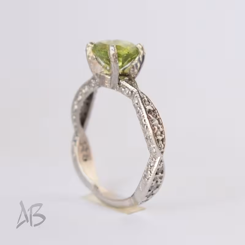 انگشتر نقره زنانه نگین زبرجد طبیعی آقابزرگ کد 614