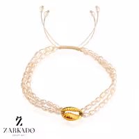 دستبند مرواریدی دو رج و پلاک طلا طرح گوش ماهی