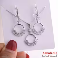 نیم ست زنانه شامل گردنبند و گوشواره استیل مدل حلقه جواهری  کد NIM14857W