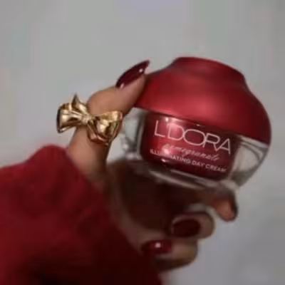 کرم روشن کننده روز صورت و گردن انار مناسب انواع پوست لدورا، 50 میلی لی