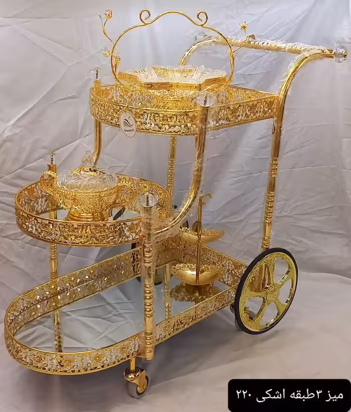 میز پذیرایی سه طبقه ال چرخ دار طرح اشکی  رنگ طلایی سایز بزرگ