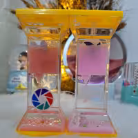 ساعت شنی (روغنی ) طرح دو قلو چرخنده دار کد T 43