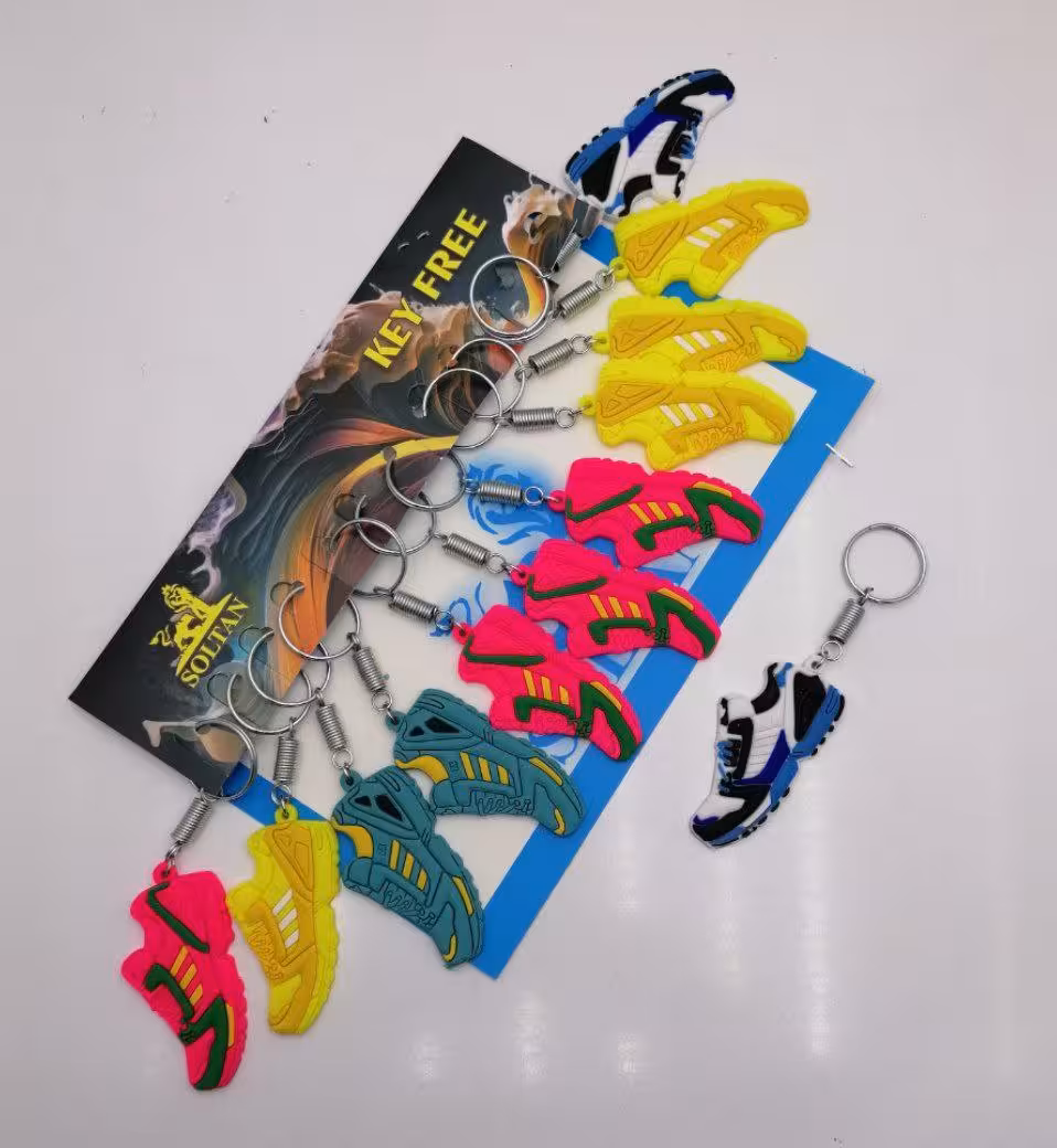 سرکلیدی سیلیکونی کفش کتانی فنری