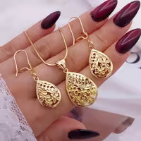 نیم‌ست زنانه بدلیجات H_M الهام‌گرفته از طلا |دو مدل براق| 1695