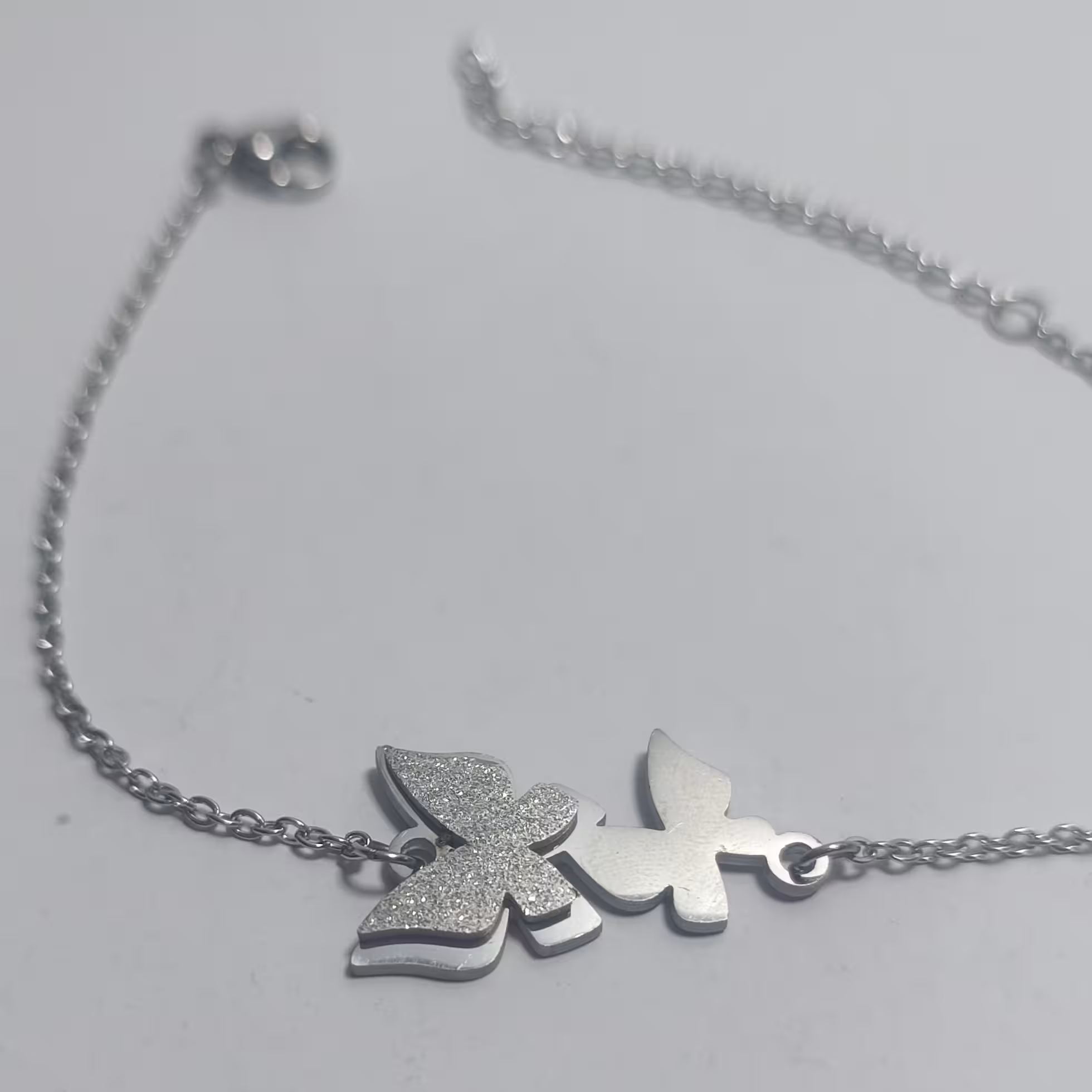 دستبند استیل رنگ ثابت نقره ای فروشگاه آیسان 