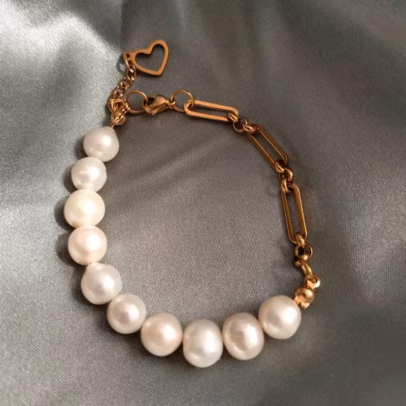 دستبند مروارید پرورشی سایز 8 کاملا گرد درجه یک متریال استیل ضد زنگ mv5