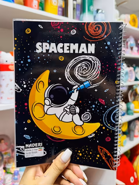دفتر مشق 60 برگ طرح فضانورد 2