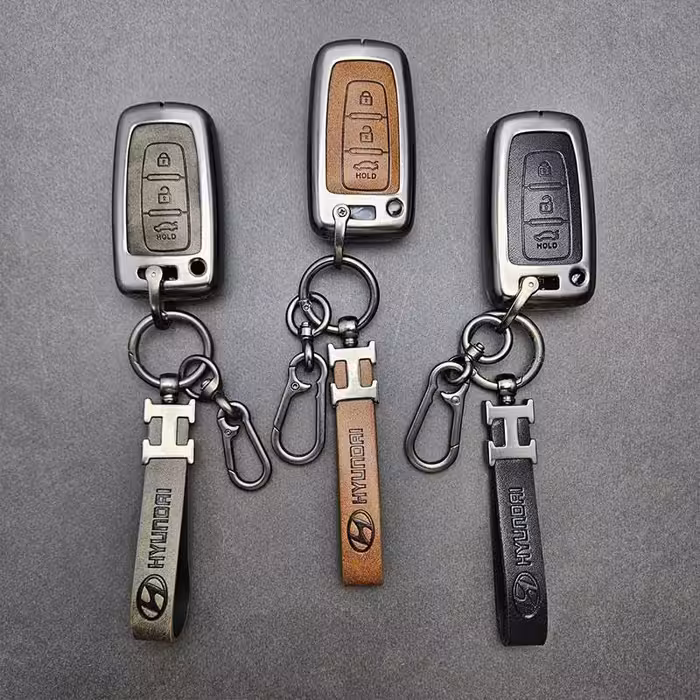 کاور ریموت هیوندایی و کیا سه دکمه دور فلزی وسط چرم اعلا