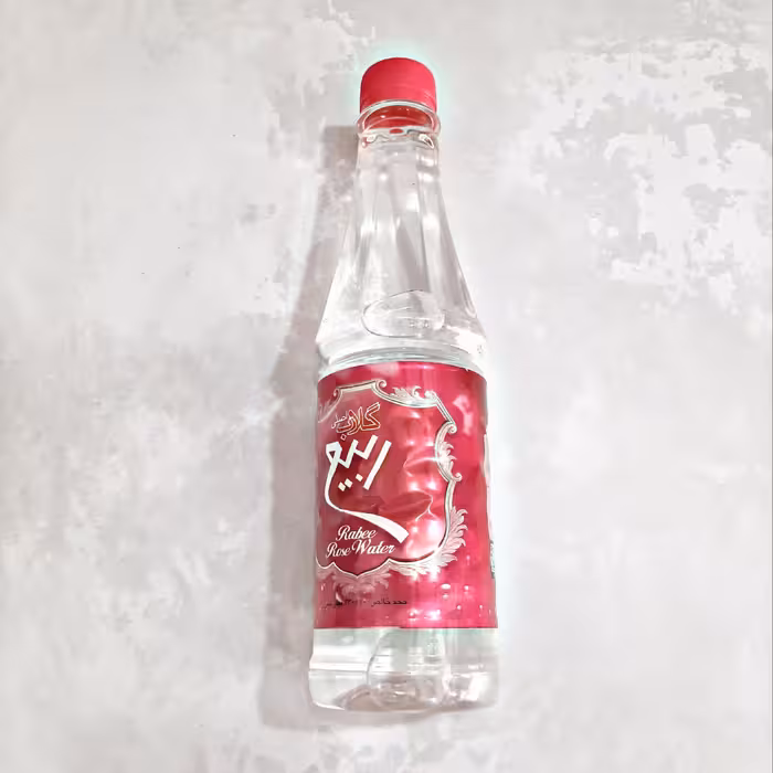 گلاب نیم لیتری اصل ربیع  طعم و بو عالی