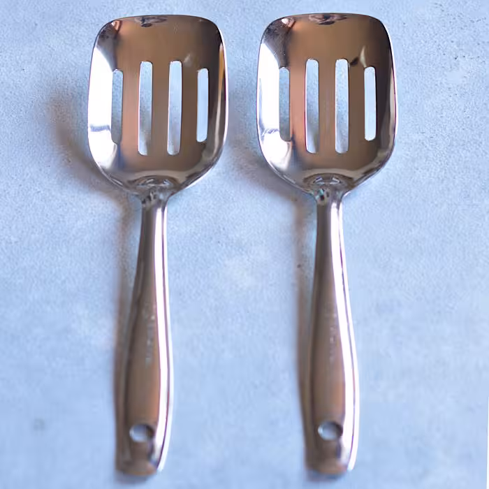 کفگیر کتلت استیل شیاردار