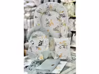 ست تشک لبه دار و آغوشگیر (قنداق سوئیسی) پیکه با بالشت و روانداز و زیرانداز تعویض طرح سافاری زرد و سبزآبی ELA