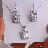 نیم ست زنانه شامل گردنبند و گوشواره استیل مدل نگینی  کد NIM14861W