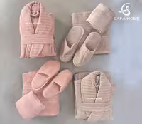 سرویس حوله عروس و داماد مدل دالورا طوسی‌ صورتی