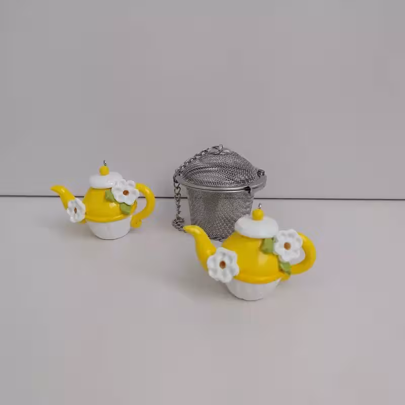آویز صافی چای بدون صافی استیل طرح قوری یک عددی | amazonchi