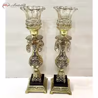 شمعدان برنزی دایکاست با پایه سنگی و لاله های شیشه ای و آویز الماسی