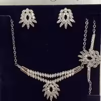 نیم ست استیل طرح نگیندار نقره ای