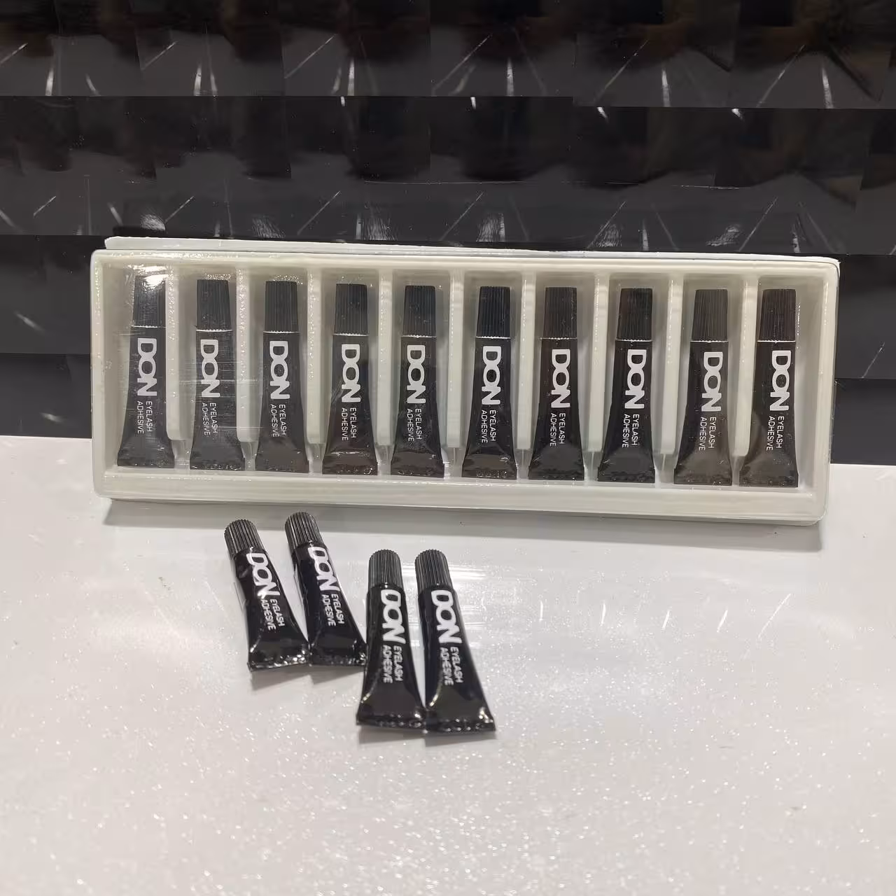 چسب مژه دان یک گرمی مشکی