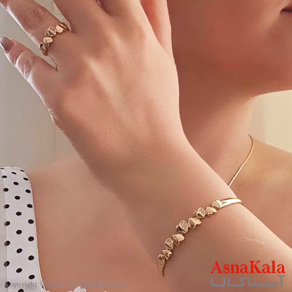 نیم ست زنانه ژوپینگ مدل قلب نگیندار شامل دستبند و انگشتر طرح طلا کد NIM14483W