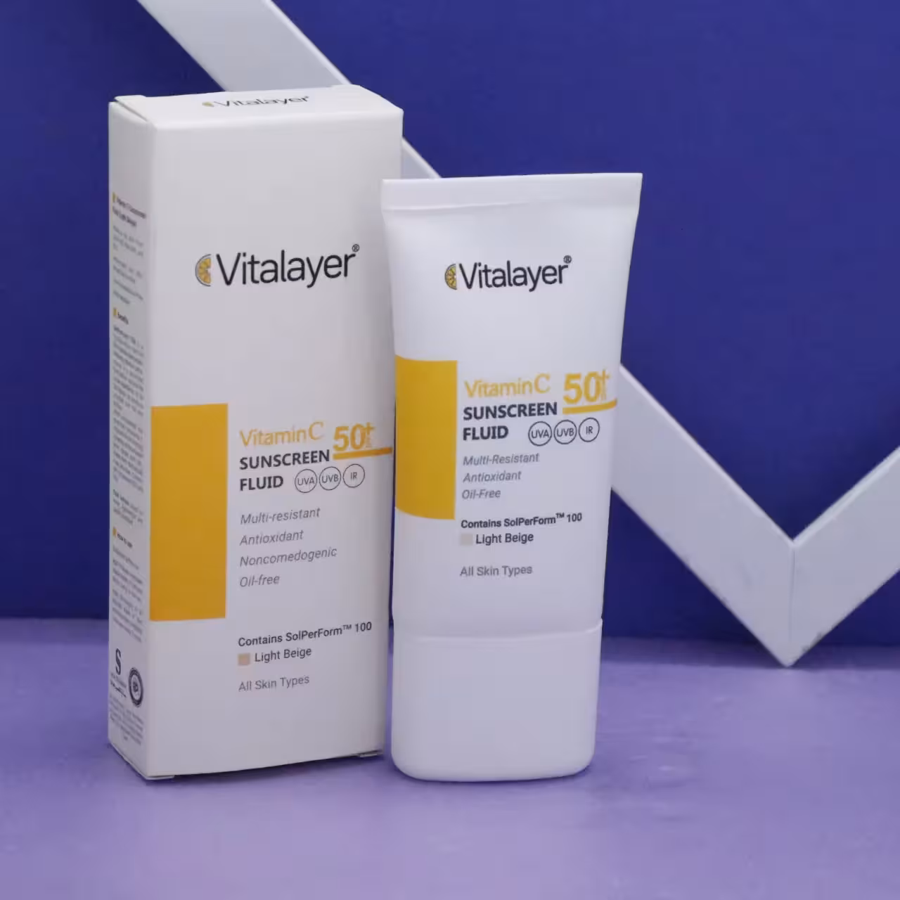 فلوئید ضدآفتاب بژ روشن ویتامین سی 50 میل Vitalayer کد 92449