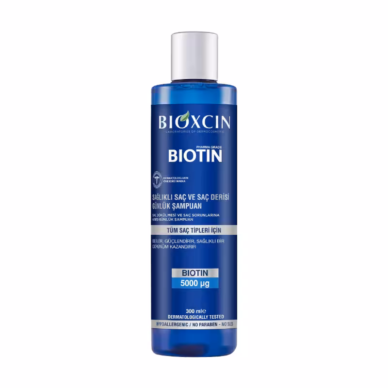 شامپو ضد ریزش روزانه مو بیوکسین مدل BIOTIN حجم 300 میل