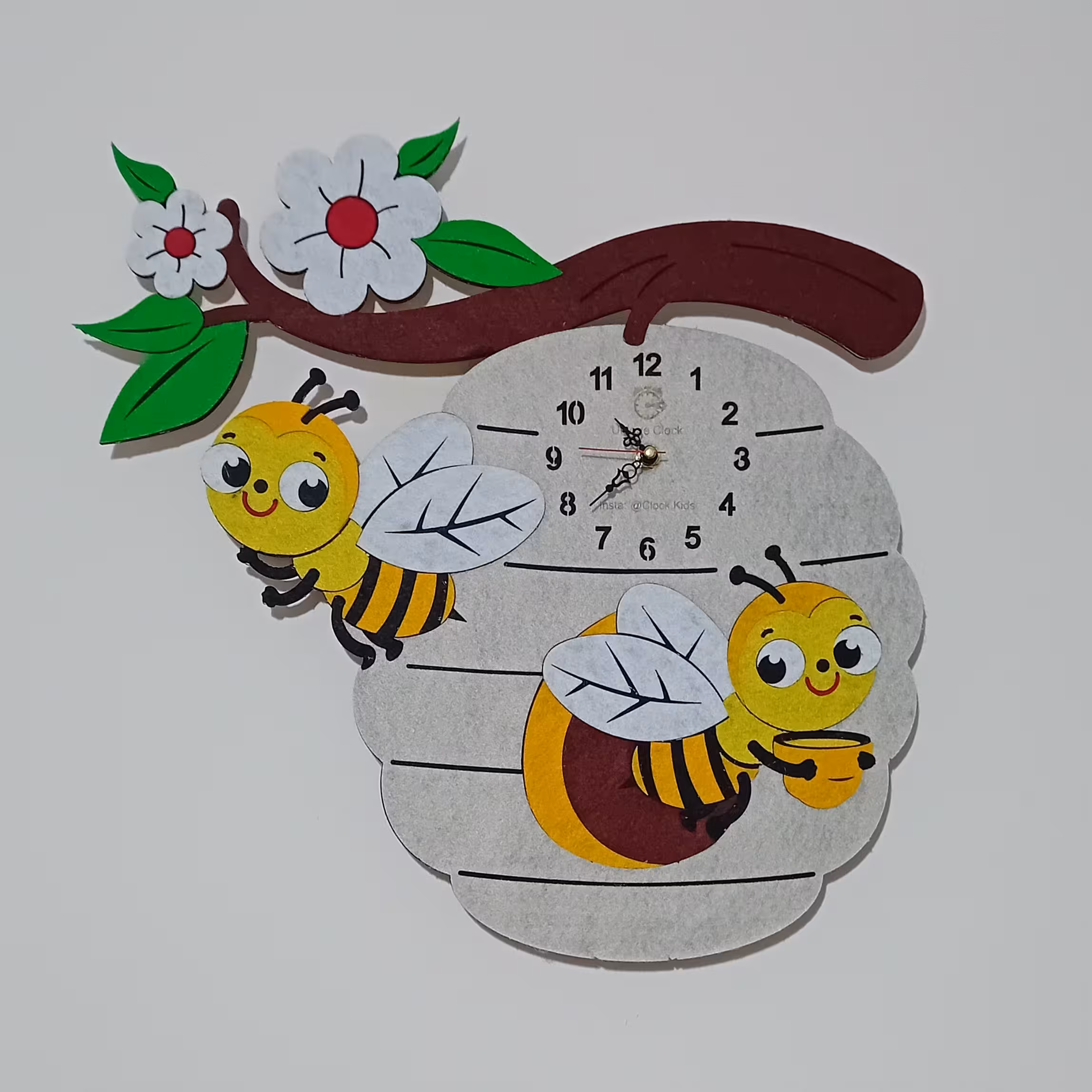 ساعت دیواری اتاق کودک فانتزی طرح کندوی عسل