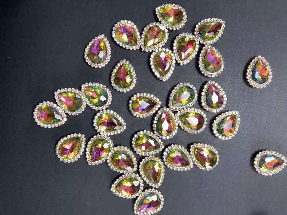 سنگ دور نگین اشکی 10 در 14 (  پر طاووسی )