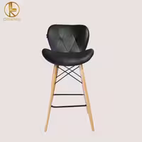 صندلی مدل زین اسبی، با پایه بلند و چوبی، طراحی ارگونومیک برای راحتی بیشتر، مناسب برای میزهای کانتر و فضاهای مدرن.