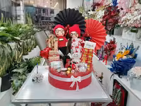 باکس هدیه شکلات و عروسک دو قلوها