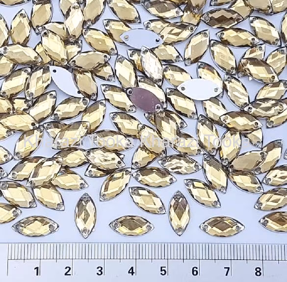 نگین مارکیز دوختنی 7*15 طلایی