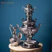 سماور گازی برنجی آبکاری شده با کروم در طرح عدسی گل و مرغ