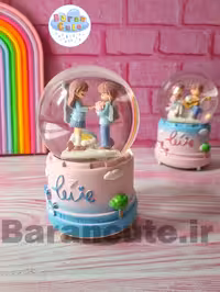 گوی موزیکال پمپی برفی چراغ دار سایز بزرگ طرح دختر و پسر