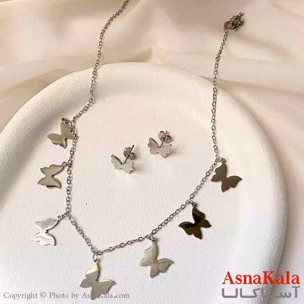 نیم ست زنانه شامل گردنبند و گوشواره استیل مدل پروانه مدرن رنگ نقره ای کد NIM14936W