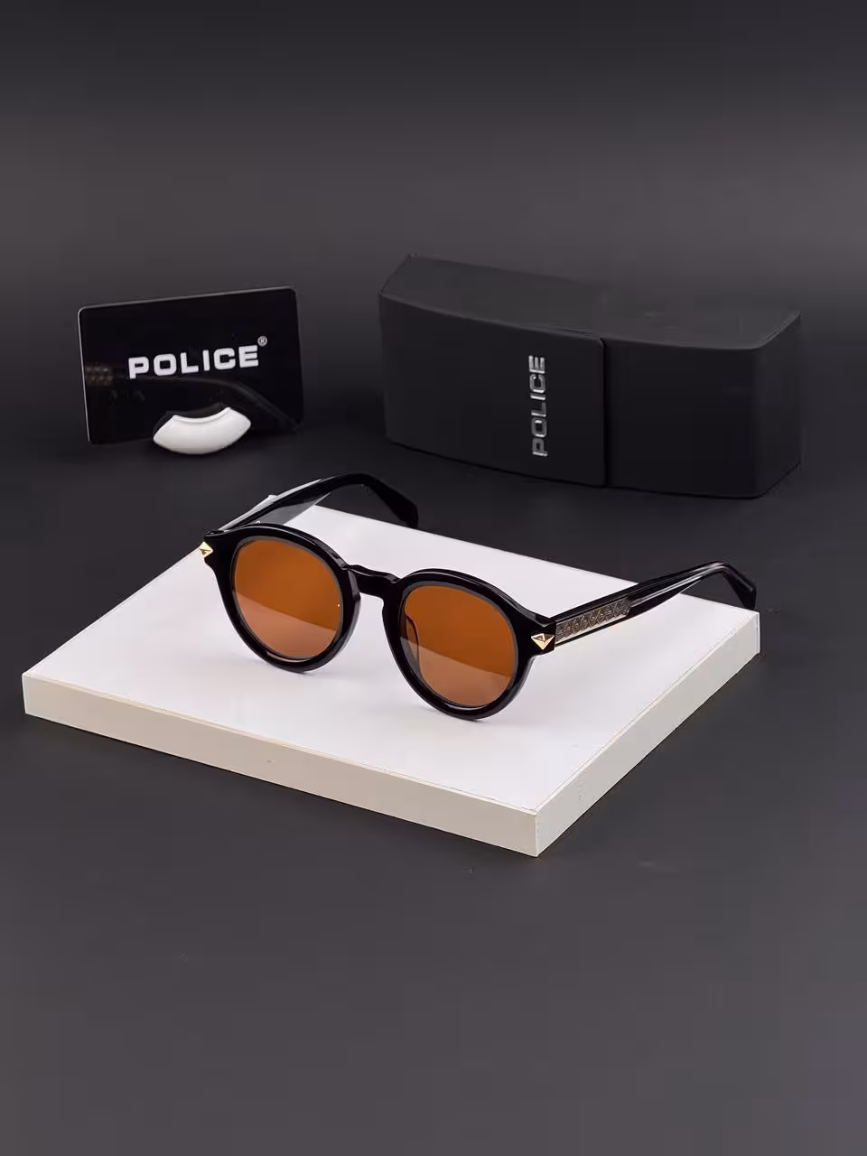 عینک آفتابی پلیس کد SPL31 فریم مشکی عدسی قهوه ای