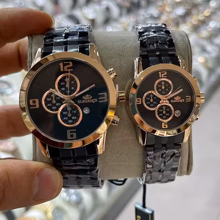 ست ساعت مچی عقربه ای زنانه و مردانه مدل استیل کد EG02