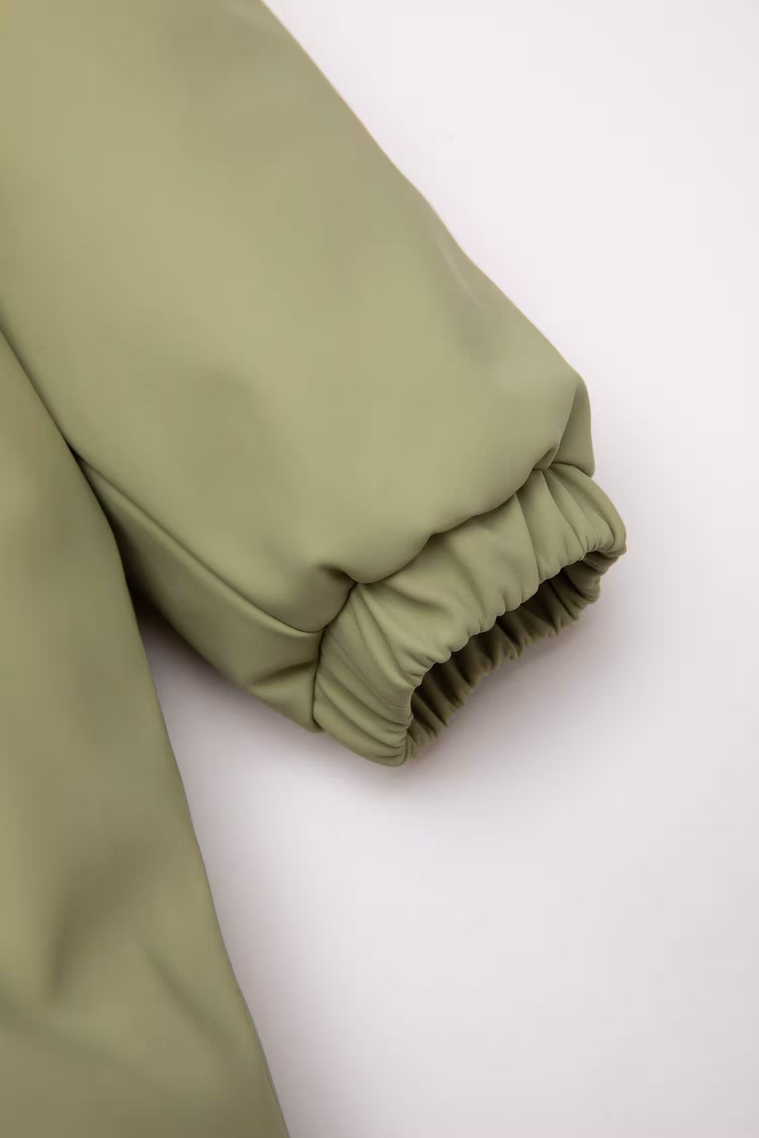 کاپشن نوزاد پسر خاکی روشن دفکتو