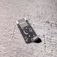 جوراب ساقدار ژاکارد ماه ستاره سیاه