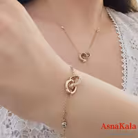 نیم ست زنانه ژوپینگ مدل دو حلقه ای شامل دستبند و گردنبند کد NIM14661W