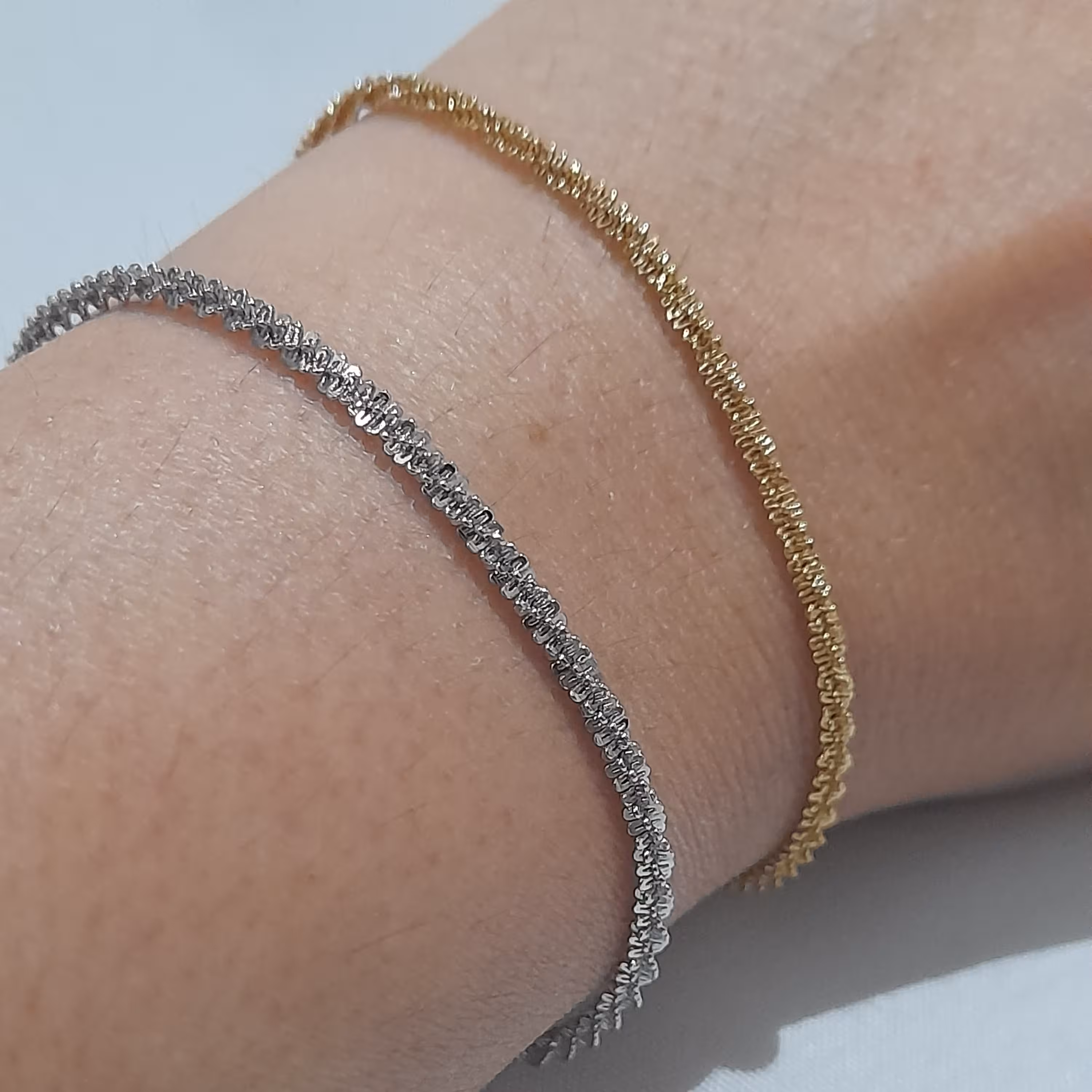 دستبند خاویاری استیل رنگ ثابت در دو رنگ طلایی و نقره ای 