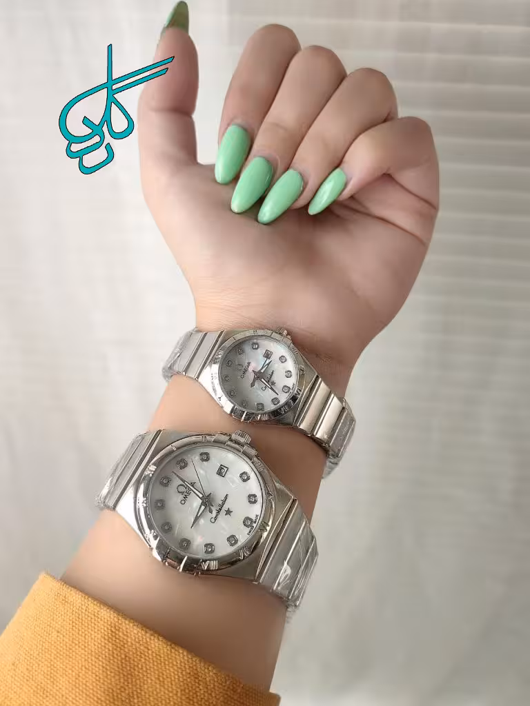 خرید ست ساعت زنانه و مردانه امگا تقویم دار دوقفله مخفی کیفیت عالی رنگ ثابت کد 2117459 - ردگل