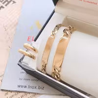 ست دستبند کارتیر و حلقه زنانه مردانه استیل طلایی 287325390