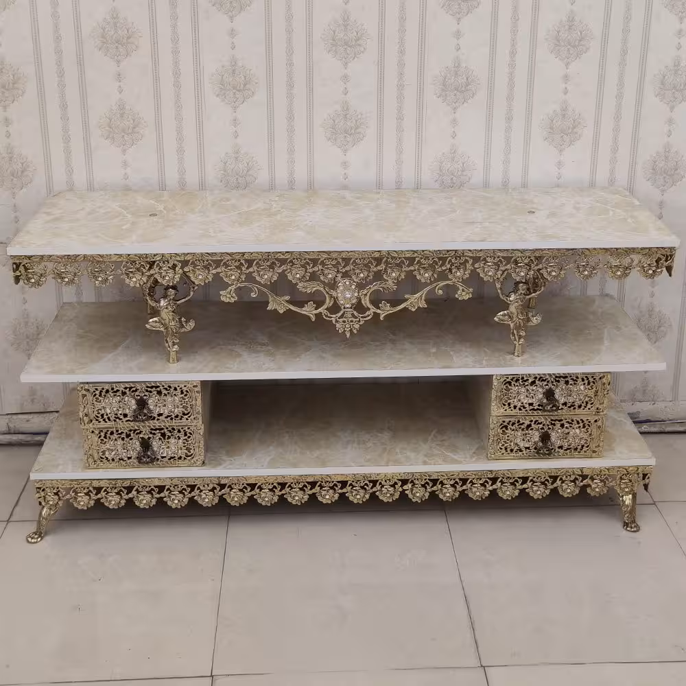 میز تلویزیون برنز صفحه هایگلاس گل رز 4 کشو تاج دار برنزی برنجی طول 140 کد 9515