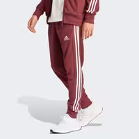 قیمت و خرید شلوار قرمز، سفید آدیداس مدل ESSENTIALS FRENCH TERRY TAPERED CUFF 3-STRIPES JOGGERS اورجینال
