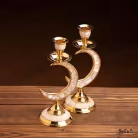 شمعدان برنجی و صدفی پایه دار تک شعله طرح هلال ماه جفت