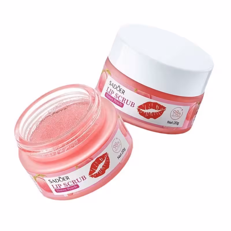 اسکراب لب آبرسان و مرطوب کننده سادور Sadoer رایحه هلو Honey Peach حجم 20g