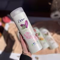 لوسیون بدن داو Dove مدل Glowing Care حجم 400 میلی لیتر
