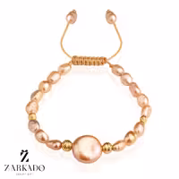 دستبند مروارید پرورشی و باروک دایره صورتی و گوی البرنادو طلا