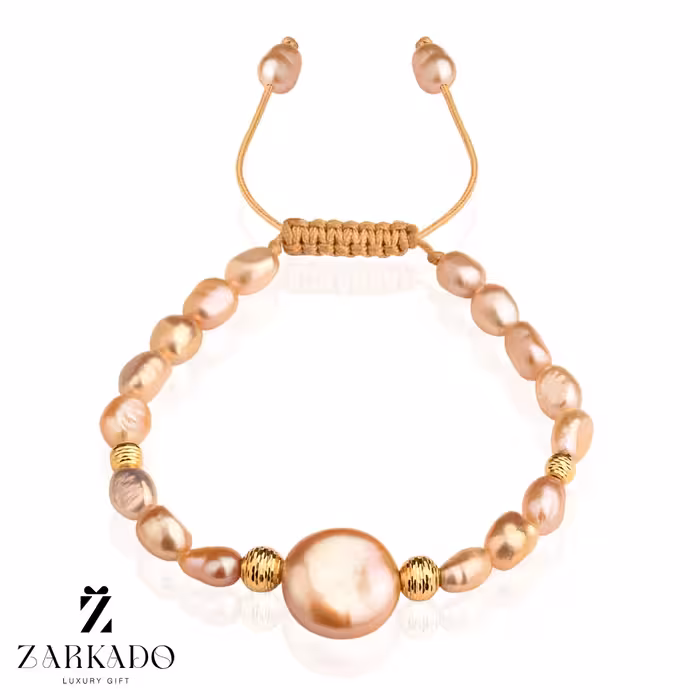 دستبند مروارید پرورشی و باروک دایره صورتی و گوی البرنادو طلا
